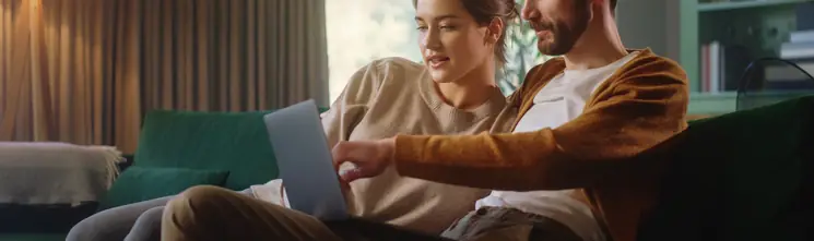 Couple reviewing HVAC financing options together at home