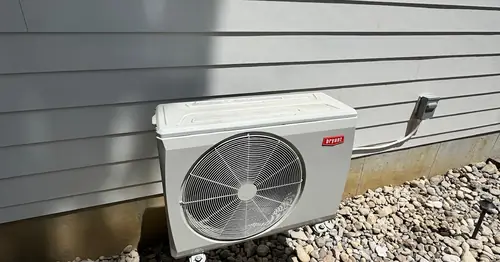 Bryant outdoor condensing unit installed beside a Cincinnati home